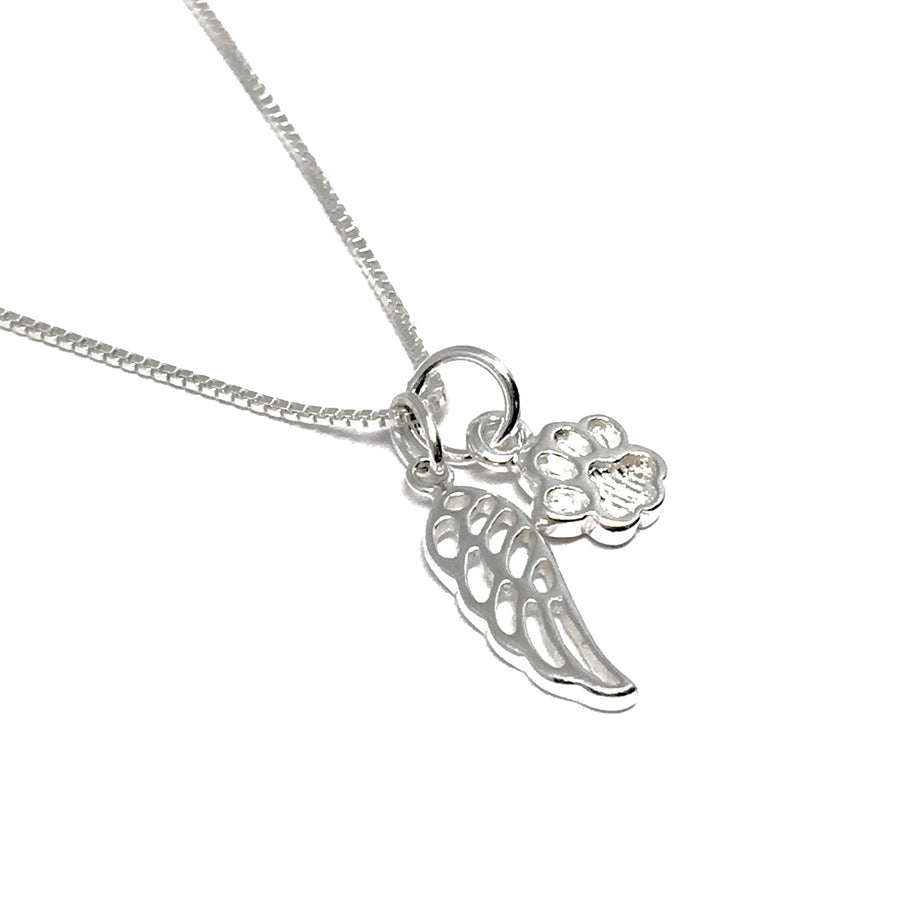 Silver angel wing and dog paw charms on a silver box chain