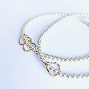 The “Golden Hearts" Sterling Silver Bracelet