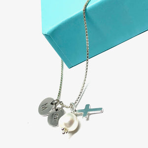 THE “MARY" CUSTOM INITIAL PEARL CROSS NECKLACE