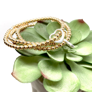 The “Open Heart" Gold & Sterling Silver Bracelet